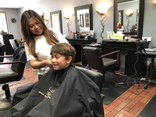 Ry's first true haircut! Trinh was so good with him. He really enjoys having a professional cut it now.