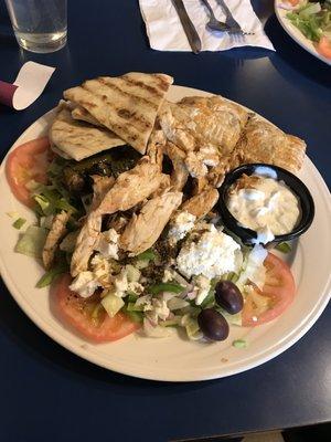 Greek Platter with Souvlaki, tzatziki, olives, grilled pita, and spinach pie