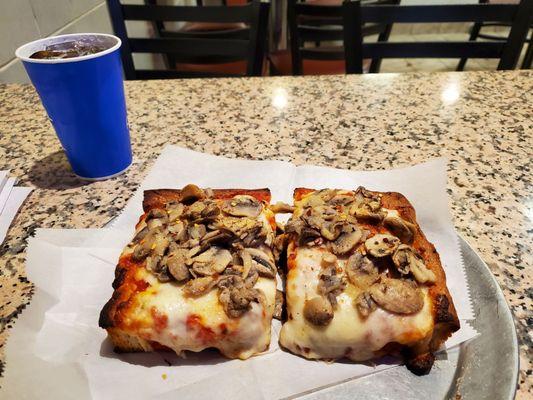 Sicilian slices with mushrooms.