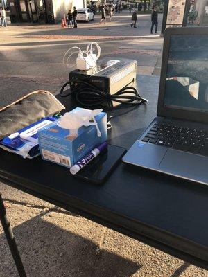 Another photo of our free tech support table on the Boston Common last summer.