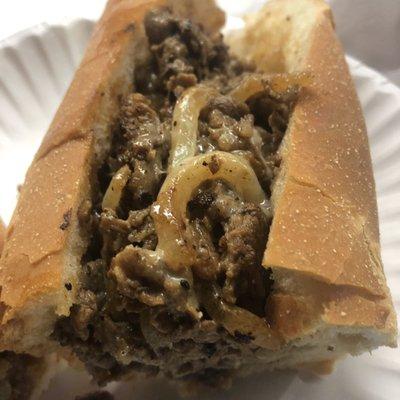 Cheesesteak with fried onions.