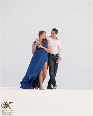 engagement photography session at White Sands. Blue dress.