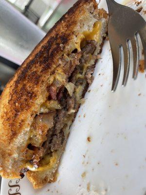 Patty melt sandwich with hash browns