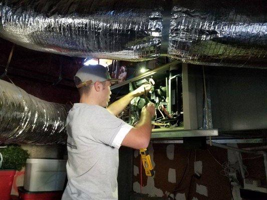 A hanging Furnace in a crawl space!