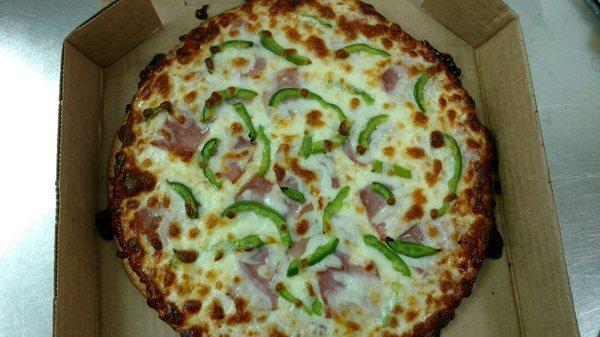 Ham and Green Pepper Pizza made on a Gluten Free Garlic Crust. All Gluten Free options are made celiac safe.