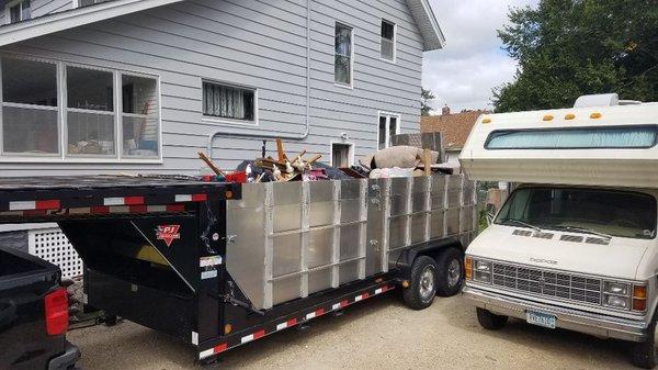 Full loads of junk in our new trailer.