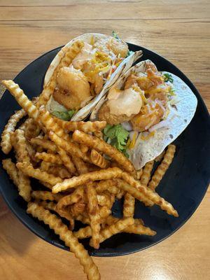 Two shrimp tacos and an order of fries.