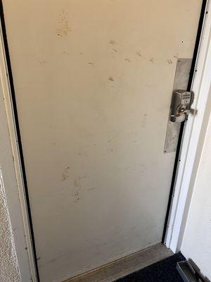 Rundown rusted unit front door