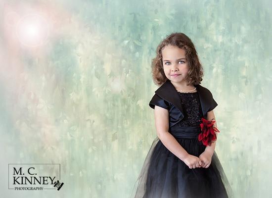 This painterly look is created to produce a timeless portrait of this young child of five years of age.