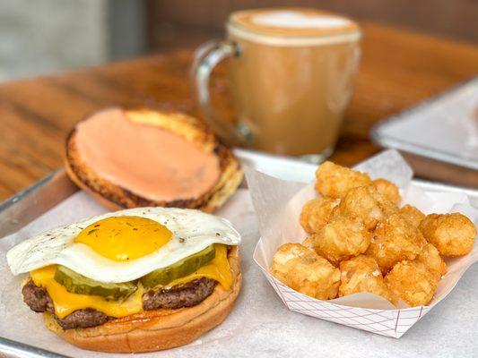 Daddy's Burgers Breakfast Burger with a Fried Egg, Pickles, Special Sauce and Daddy's Tots