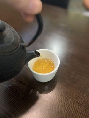 No better art photo than pouring tea