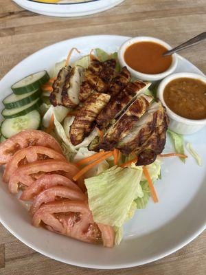 Chicken Satay salad with peanut sauce and ginger sauce