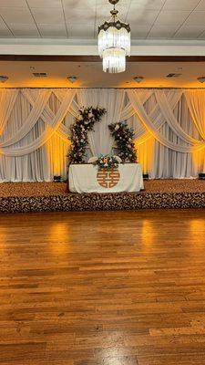 Mary and her team repurposed the ceremony illusion floral arch over to our sweetheart table at the reception site