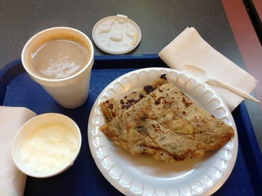 Aloo paratha, homemade yogurt, and sweet chai for breakfast. Really good!