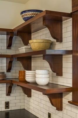 Floating shelves showcase favorite dishes