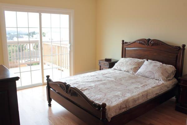 Colonial bed and nightstands in staged San Francisco home