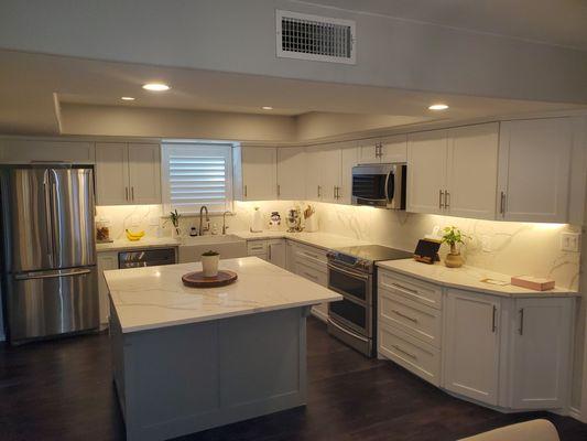 For a kitchen remodel, consider updating cabinets, flooring, paint, appliances, and lighting to create a cohesive and stylish space.