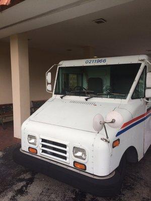 Steve's truck parked under the portico