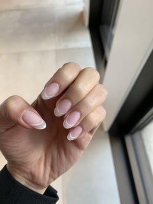 Gel nails with French tip design