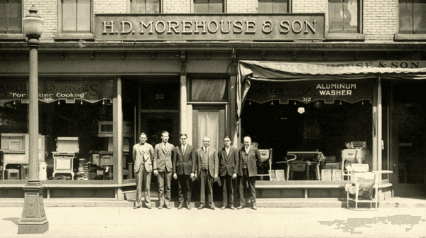 Leslie Morehouse, son of the founder with his sales staff in 1928