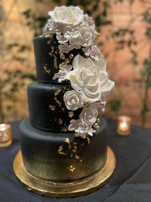 The Smith's Wedding Cake from 1/28/22 created by Plumeria. Two tiers of Champagne Orange and one tier of Strawberry.