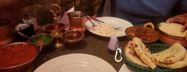 Entrees, naan appetizer, and chutney trio, lamb entrée