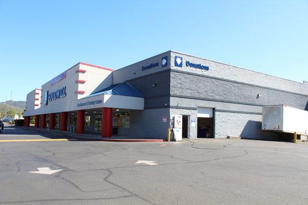 Exterior of store showing area for donations, as well.