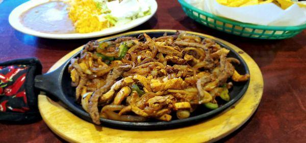 Diablo Fajitas (chicken, steak, and chorizo). I'm hooked. The rice and beans are great!