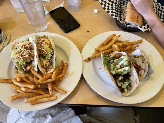 Chicken Chorizo Tacos (left) and one remaining Teriyaki Sriracha Pork Belly Taco (right)