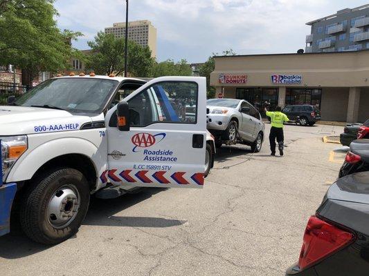 AAA taking the car to Sanchez in Pilsen. They backed it into the garage and it was quick and easy.