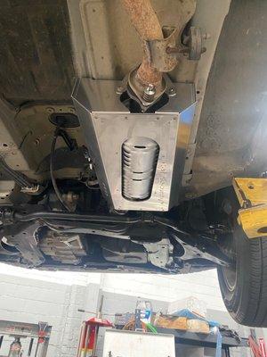 Honda Element catalytic converter replacement and shield installed.