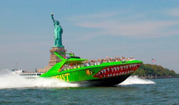 The Beast speeding past the Statue of Liberty