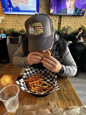 Ron (aka my hubby Ronaldo) taking his first bite of his Double Smash Burger