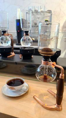 A wonderful siphon brewed Kenyan at caffe d'bolla.