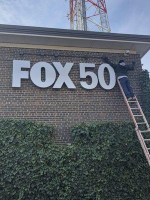 Wiring of Fox 50 exterior sign at WRAL building