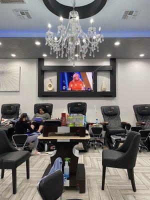 Beautiful pedicure area with about 14 chairs