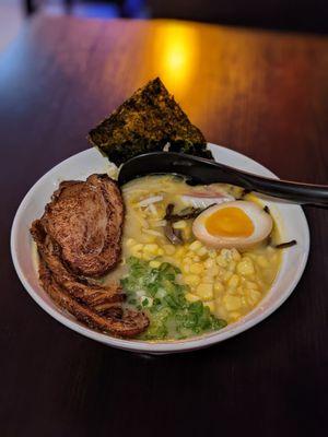 Chashu ramen with corn. Bamboo shoots held.