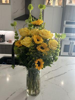 He attended St Leo's and one table displayed items from his days there.  These flowers matched the school colors.