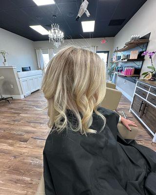 From Platinum blonde heavy highlights to a soft blonde with dimension.
 -Hair by Michelle