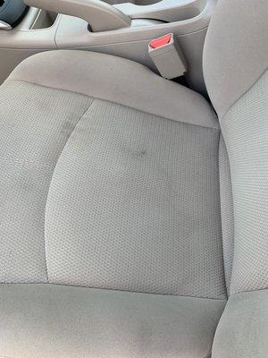 Hand print grease stain on seat