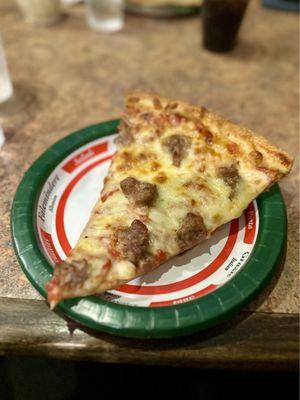 slice of sausage pizza ($3.95)