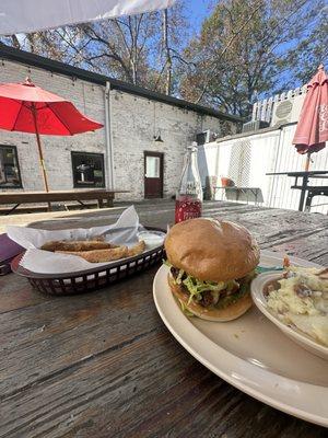 Fried chicken sandwich, potato salad, fried pickles, & a bottled Shirley temple