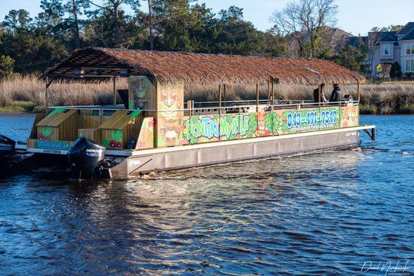 Explore the Intracoastal Waterways with PonTiki Myrtle Beach, where adventure meets comfort on our spacious tiki boat.