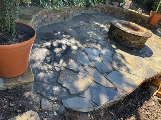 New flagstone patio and outdoor fire pit