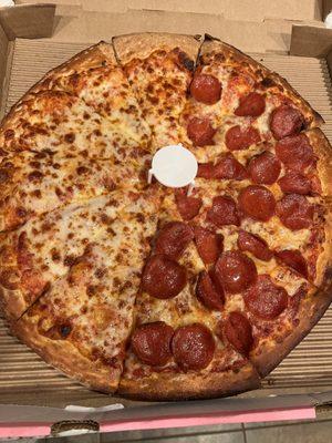 Large half cheese, half pepperoni pizza