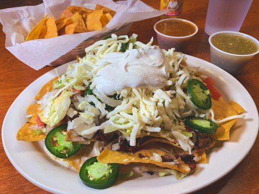 Steak & chorizo nachos - supreme - add fresh chopped onion and fresh sliced jalapeno.