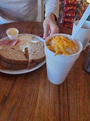 Breakfast sandwich and breakfast in a cup