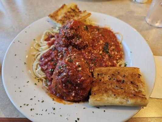 Spaghetti and meatballs.  With garlic bread.