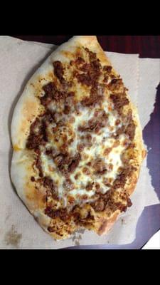 Fresh baked lamb pizza for breakfast only 8:00 to 12:00