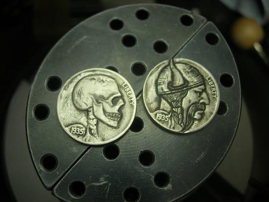 "Hobo Nickles".  Original Indian head nickles are re-engraved in creative ways.